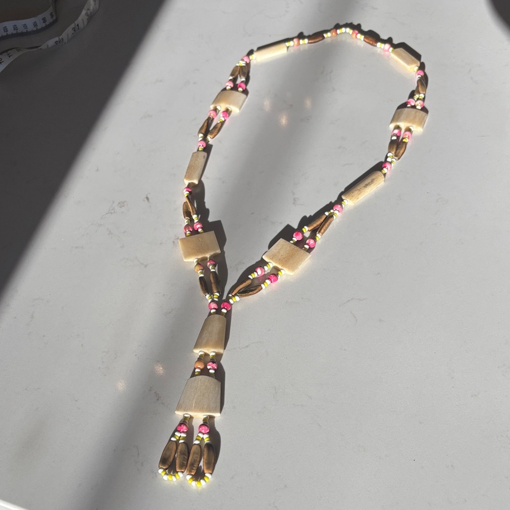 Elegant Beaded Necklace with Pink and yellow Accents